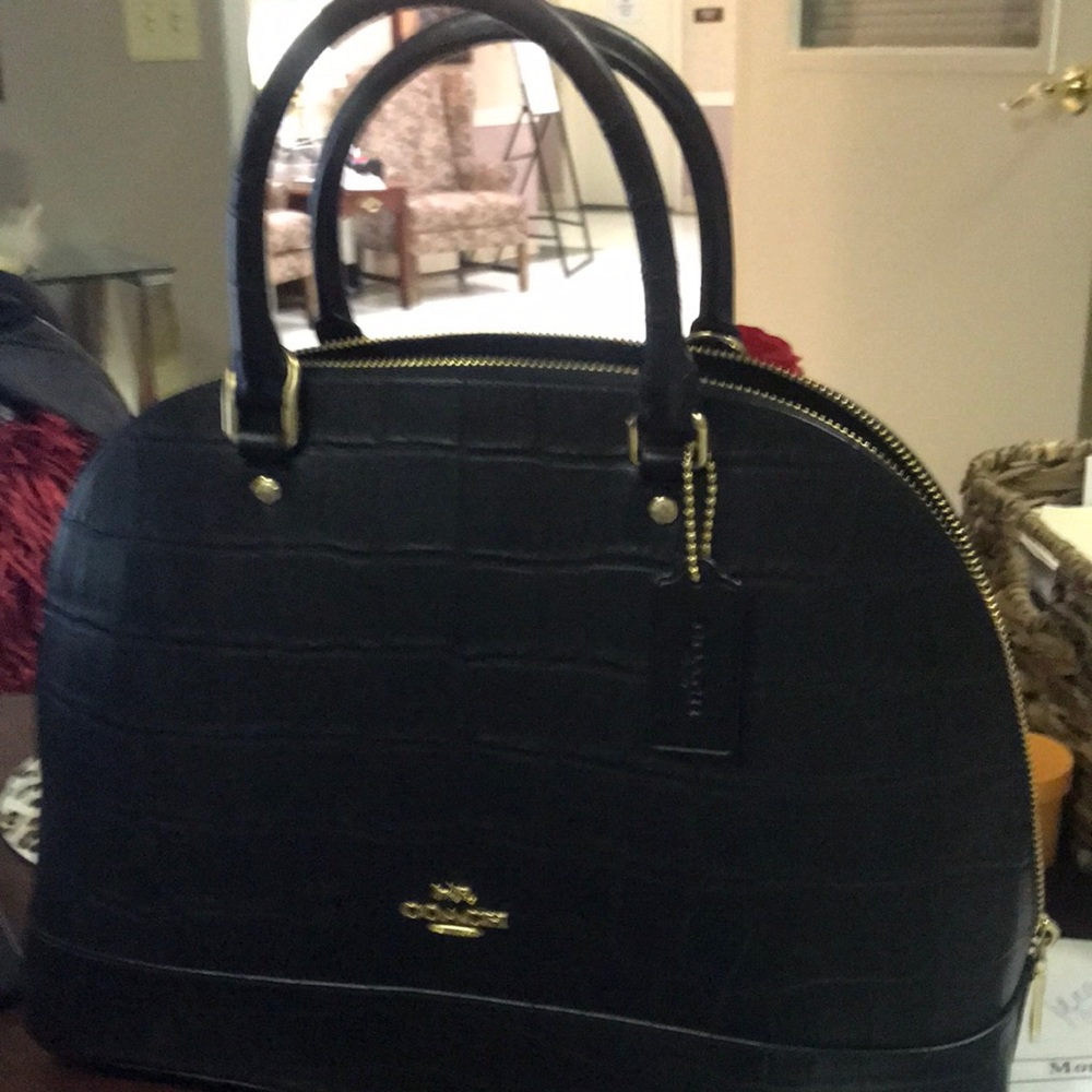 New.Coach black snakeskin leather handbag..